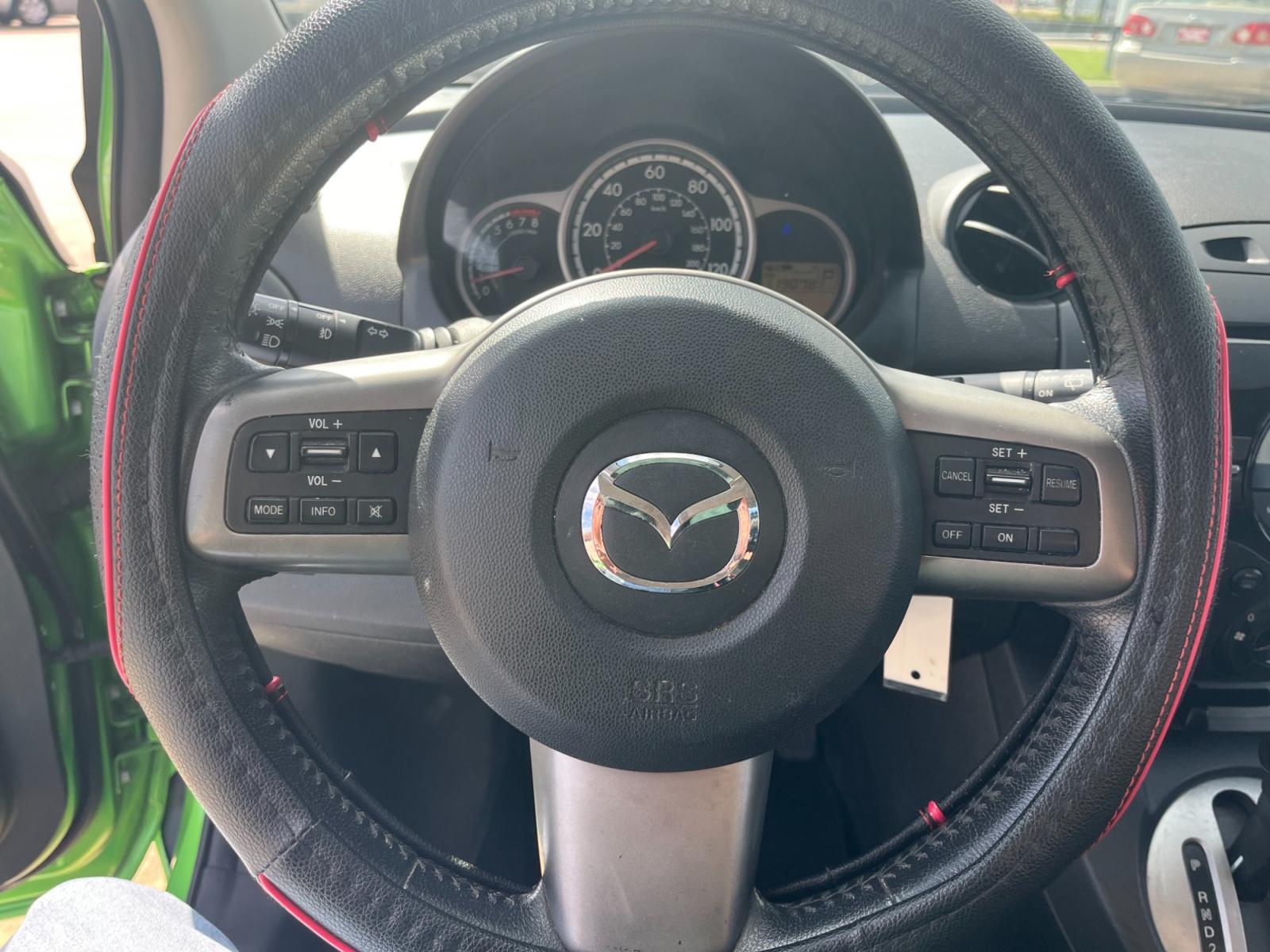 2013 green /black Mazda MAZDA2 Touring (JM1DE1LY1D0) with an 1.5L L4 DOHC 16V engine, Automatic transmission, located at 14700 Tomball Parkway 249, Houston, TX, 77086, (281) 444-2200, 29.928619, -95.504074 - Photo #15